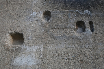 texture of a rough old wall. background and texture of a rough old building wall. old cracked wall