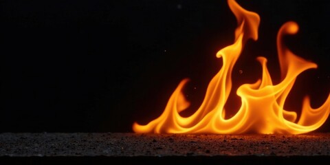 Fototapeta premium Abstract Fiery Orange Flames Dancing on Dark Surface, a Glowing Ember Display
