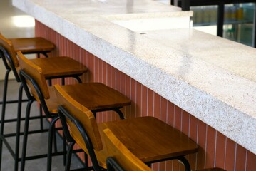 interior of a cafe with wooden chair stool