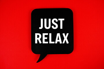 Just Relax text with speech bubble on red background