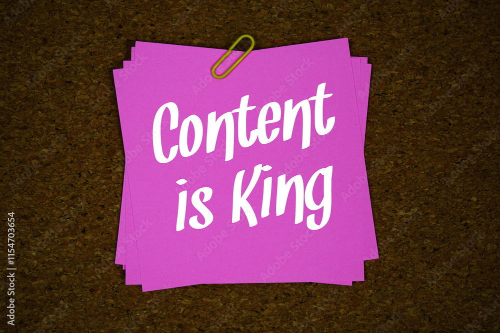 Poster content is king text message on stick note on cork paper background