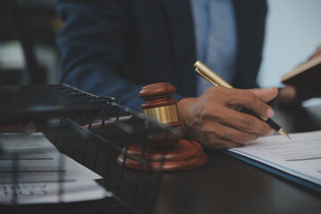 Law theme, gavel or mallet of the judge, lawyer enforcement officers, evidence-based cases taken into account in the court abount business, legislation.