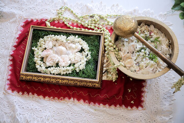 Wijikan or ranupada, the procession of the bride washing the groom's feet. Indonesian javanese traditional wedding ceremony.