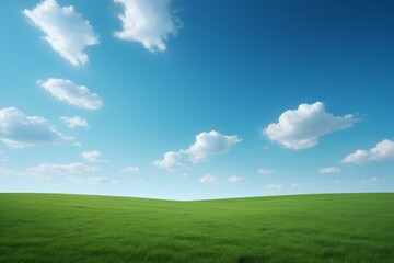 Fototapeta premium there is a green field with a blue sky and clouds
