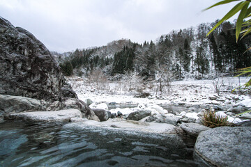 Winter Onsen Hot Spring in Mountain Landscape