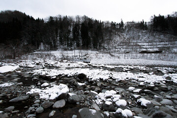 Snowy Riverbed with Forest in Winter, Shinhotaka, Japan