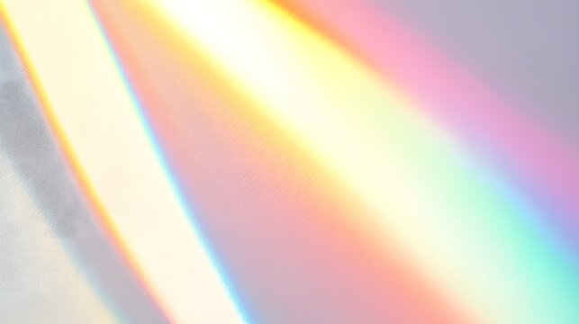 Blurred rainbow light refraction texture overlay effect for photo and mockups. Organic drop diagonal holographic flare on a white wall. Shadows for natural light effects