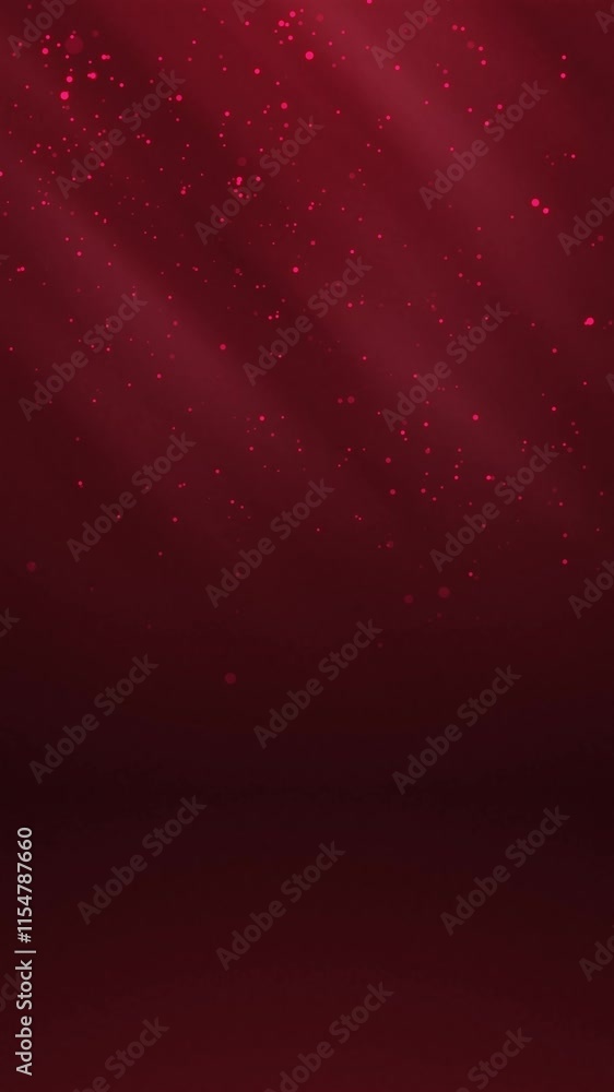 Poster red glowing circles particles falling in the air and light rays at the top left of a cyc wall backgr
