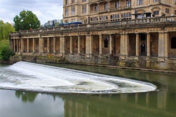 Pulteney Weir a famous World Heritage site on the River Avon in Bath, Somerset, England.