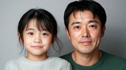 Obraz premium Happy Asian Father and Daughter Portrait