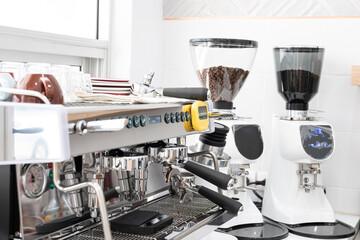 Coffee machine prepare making coffee menu in the cafe.Professional bronze coffee machine stands on a desk in a cafeteria.