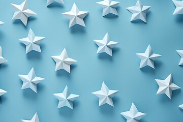 Obraz premium White Origami Stars on Blue Background 