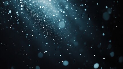 Obraz premium Falling Snowflakes Against the Night Sky Creating a Winter Atmosphere