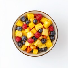 Colorful fruit salad in a bowl. Featuring mixed tropical fruits
