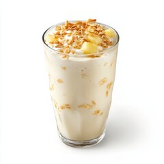 Delicious coconut smoothie in a glass. Featuring coconut flakes and pineapple