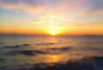 Obraz premium Elegant Blurred background of a sunset over the ocean.