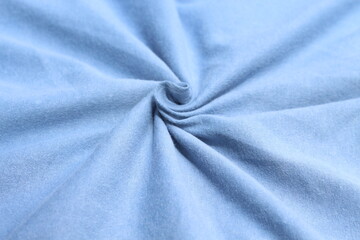 detailed crumpled blue t-shirt fabric. ideal for textile design or fabric texture visuals.