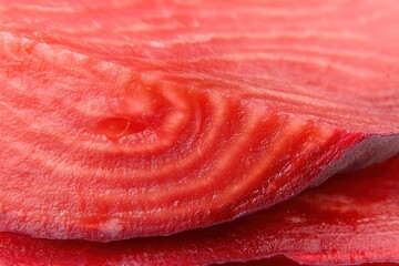 Vibrant beetroot slice showcasing concentric patterns kitchen food close-up fresh produce culinary art