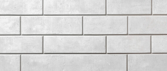Obraz premium Concrete construction. Gray brick wall with a uniform and smooth texture.