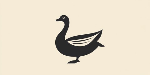 Fototapeta premium The logo or emblem representing a goose, which is an animal and a type of bird, is often referred to as the goose logo or goose symbol.