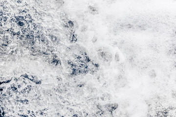 Closeup of foamy water waves