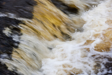 Closeup of foamy water waves