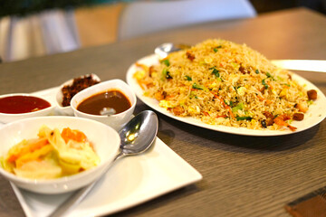 fired rice with tomato sauce, vegetable chopsuey image