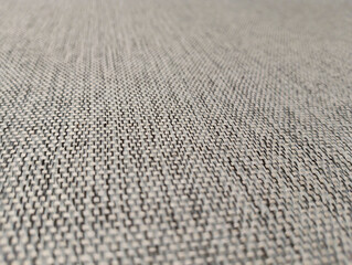 Close up Texture of a Neutral-Colored Fabric with a Subtle Weave Pattern