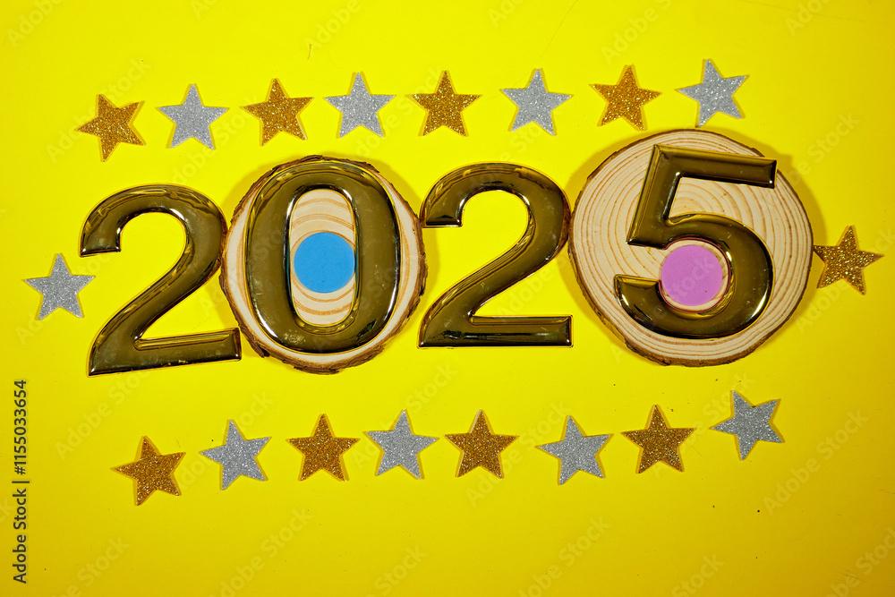 Wall mural golden numbers 2025 two thousand twenty five new year with colorful stars confetti on yellow background