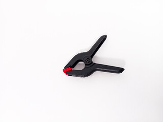 black plastic clamp isolated on white background, for industrial manufacturing plastic product catalog design