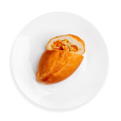 Baked pie with cabbage, on a white background, isolated. Top view.