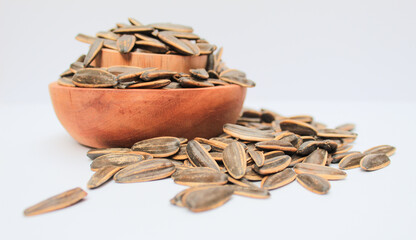 sunflower seeds in a wooden bowl