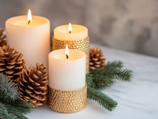Elegant candles with pinecones create a cozy atmosphere.
