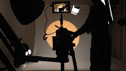 Professional studio for photo video filming with modern lighting equipment and large white...