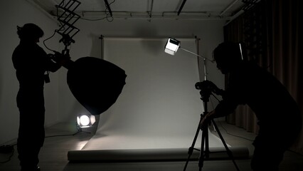 Professional studio for photo video production filming with modern lighting equipment large white...
