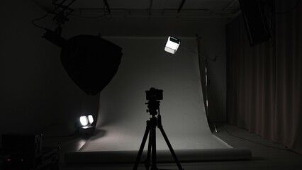 Professional studio for photo and video production filming with modern lighting equipment, large...
