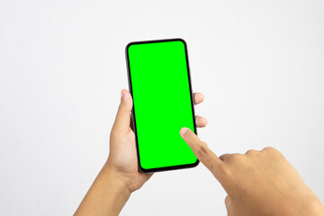 Hand holding smartphone with blank screen isolated on white background