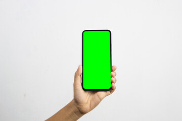 Hand holding smartphone with blank screen isolated on white background