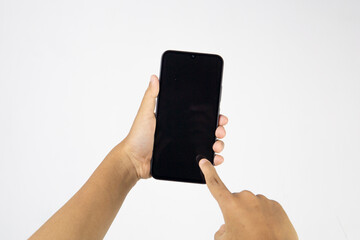 Hand holding smartphone with blank screen isolated on white background