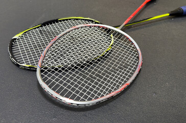 badminton racket with white strings