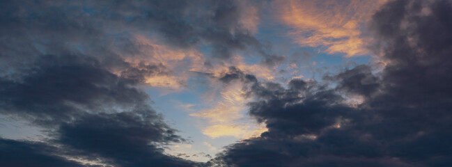 beautiful and dramatic sunset clouds background 