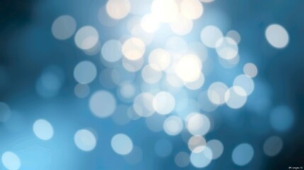 A de-focused abstract background featuring shimmering glitter lights in blue, gold, and black hues.