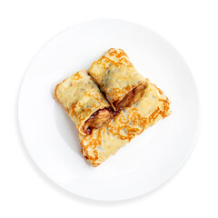 Russian pancakes with banana and caramel, on a white background, isolated. Top view.