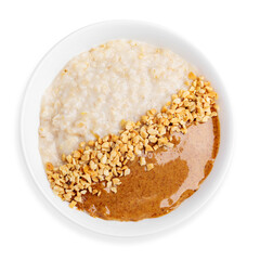 Oatmeal with peanuts and peanut butter, on a white background, isolated. Top view. Breakfast