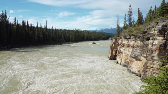 Athabasca river near Athabasca Falls. Jasper National Park, Alberta, Canada. Canadian Rockies summer landscape.