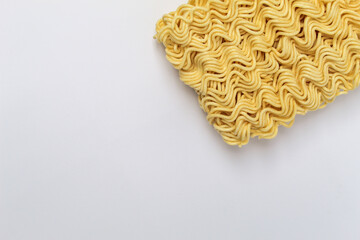 noodle shape with white background. instant noodles commonly eaten by asian people. image with white background isolated