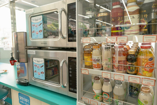 Busan, South Korea - May 25, 2017: Daewoo microwaves for reheating food, as seen inside the GS25 convenience store in Busan.