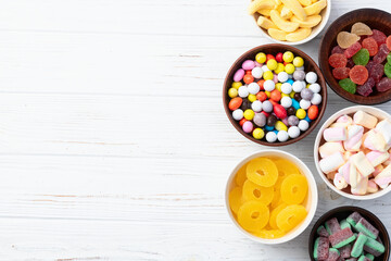 Mix of colorful candies . Top view