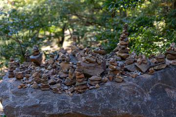 Small stone towers on a large rock