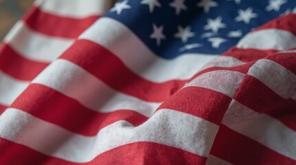 Obraz premium close-up view of the American flag, prominently displaying the stars and stripes, with the fabric gently waving in the breeze